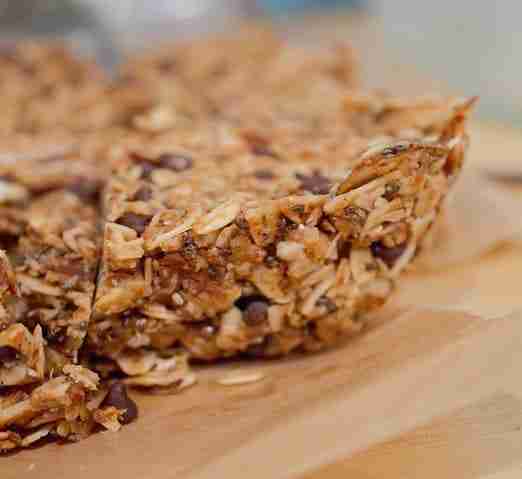 Homemade healthy granola bars against butcherblock countertop